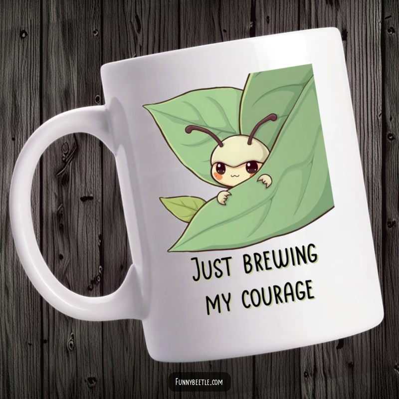 Funny mug featuring a shy beetle character peeking from behind a large green leaf, symbolizing shyness and a gentle, curious nature.