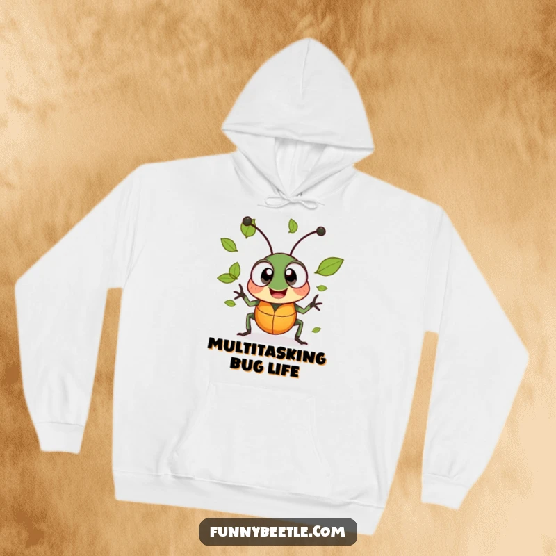 Funny hoodie featuring a cheerful beetle with large excited eyes, comically juggling tiny leaves, radiating pure enthusiasm.