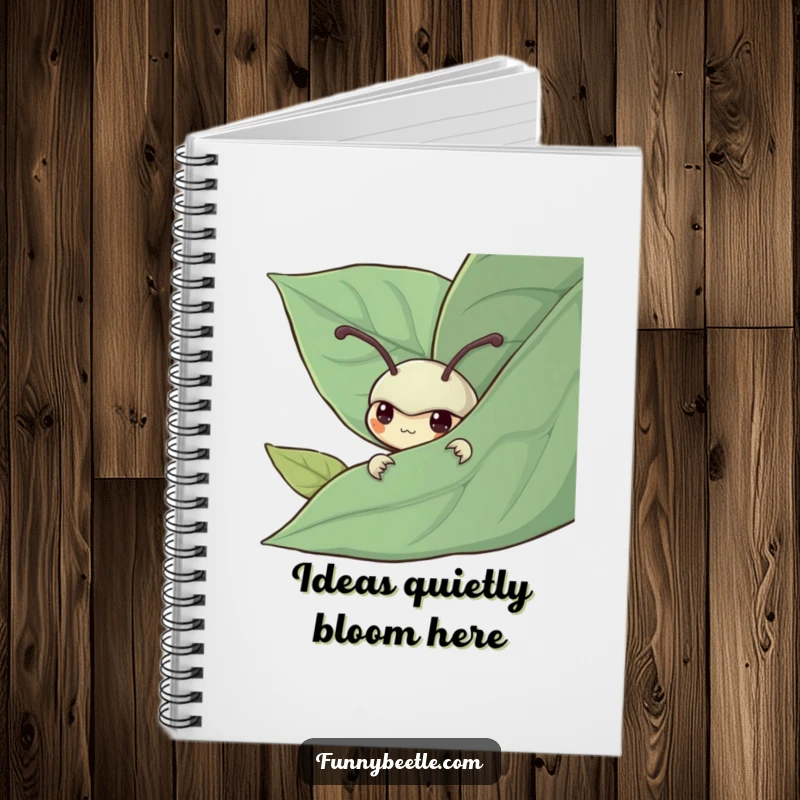 Funny notebook featuring a shy beetle peeking from behind a leaf, designed for capturing quiet thoughts and gentle observations with humor.