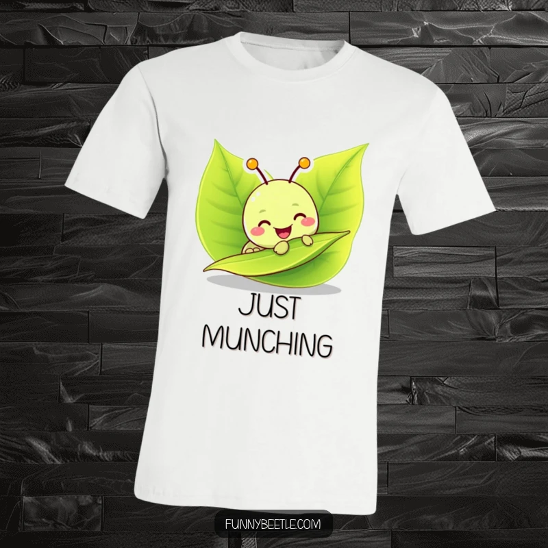 Funny T-Shirt: A cheerful caterpillar character enthusiastically eating a bright green leaf, showcasing a fun-loving and food-focused personality.